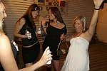Andrea Buser and Allison Raisfiels trying perfume from Jenna Zito+Gina Denezzo at the Maxim Magazine Party at Club Dune in Southampton, NY, Saturday, May 26th, 2007